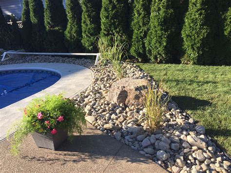 pool landscaping with rocks