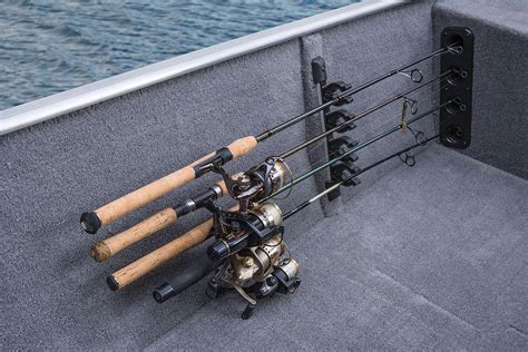 Small aluminum fishing boat with rod holders