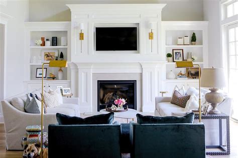 sconces flanking tv