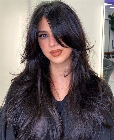 short layers on long hair with curtain bangs