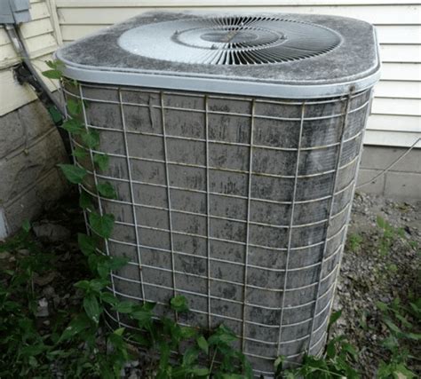 spraying water on ac condenser while running