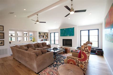 two ceiling fans in one room