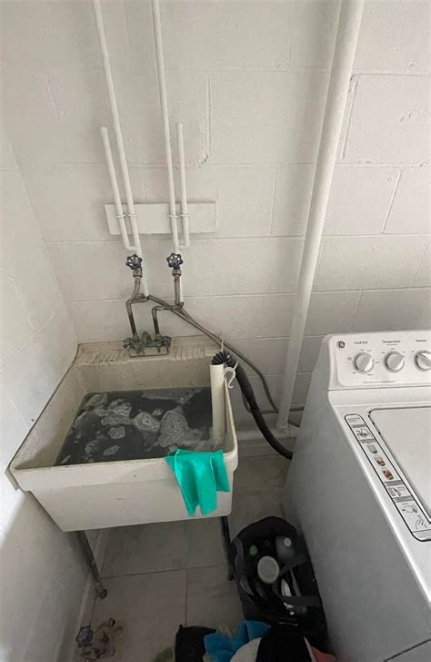 washing machine draining into sink