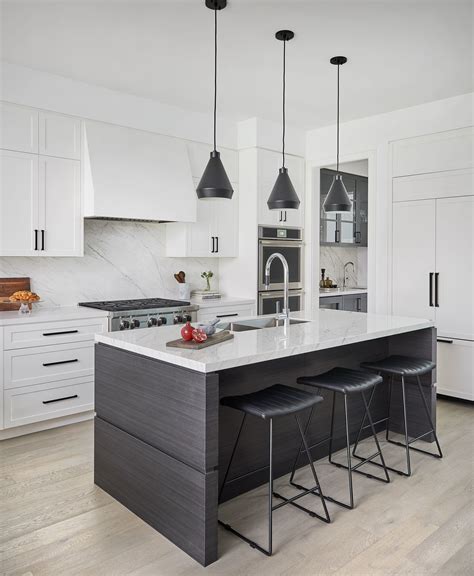 white kitchen dark island