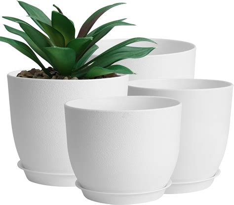 white plastic flower pots