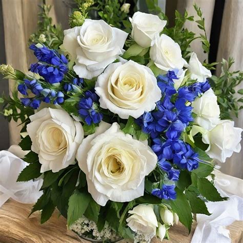 white roses with blue tips